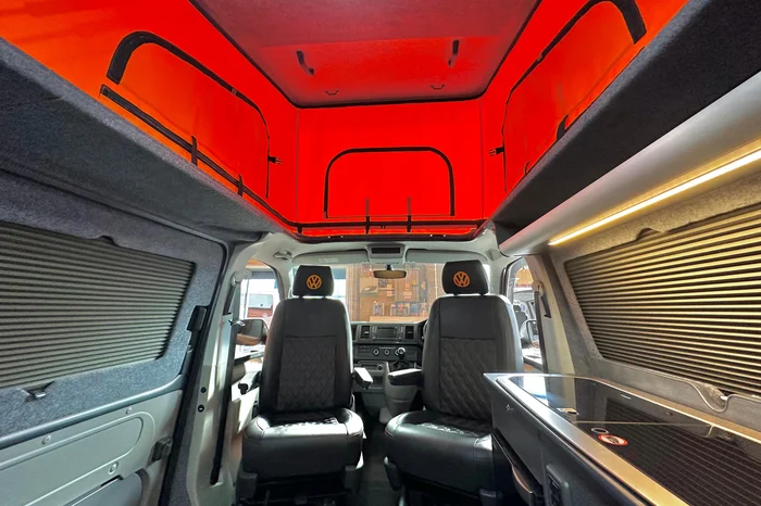 VW T5 Camper interior with red pop top roof